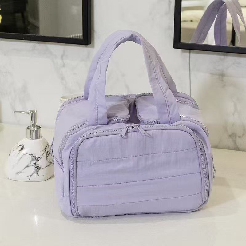 Fashionable and Simple 2025 New Style Makeup Bag, Large Capacity, Divided and Layered Toiletry Bag, Portable Travel Makeup Storage Bag